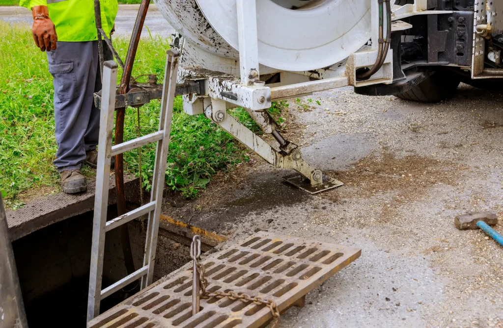 A hydro jetting machine for cleaning blocked drains outside of a home.